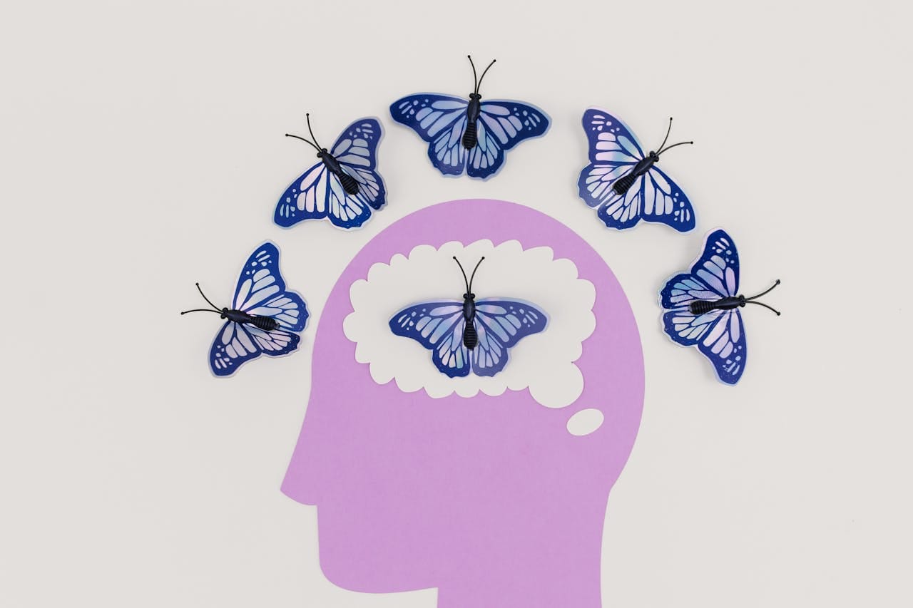 Butterflies Around a Head